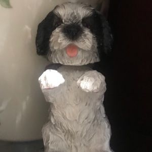 Dog bobble head figurine